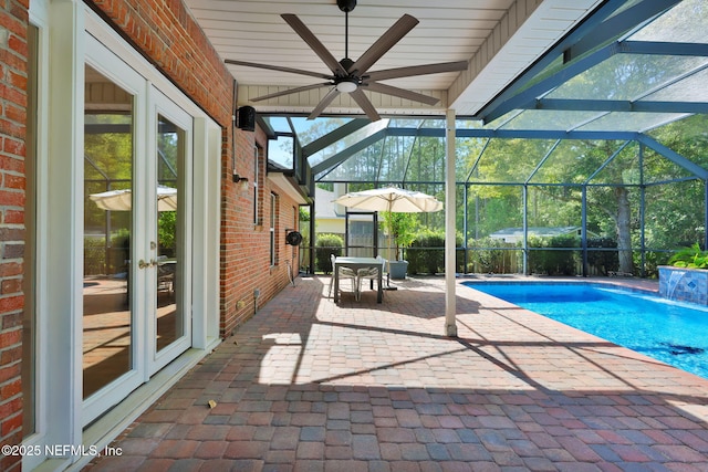 outdoor pool featuring a patio area, french doors, a lanai, outdoor dining space, and ceiling fan