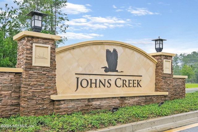 view of community sign