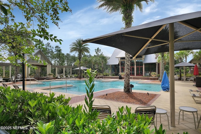 pool featuring a patio area