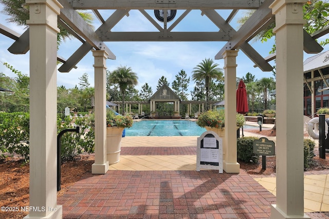 view of pool featuring a patio and a gazebo