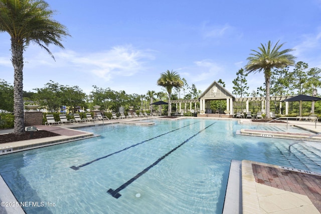 pool featuring a gazebo and a patio