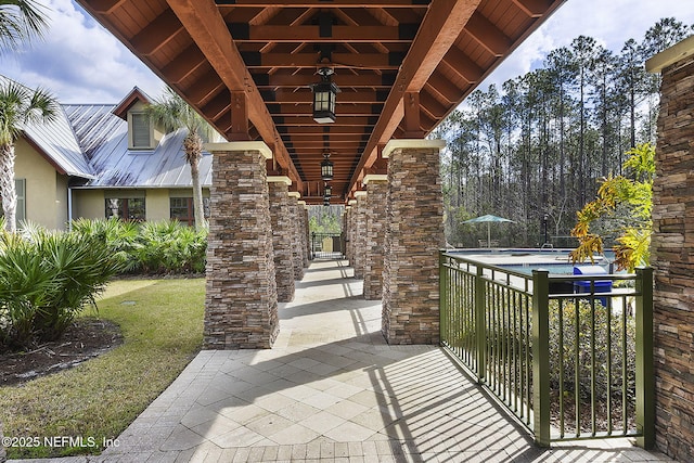 view of patio featuring a fenced in pool