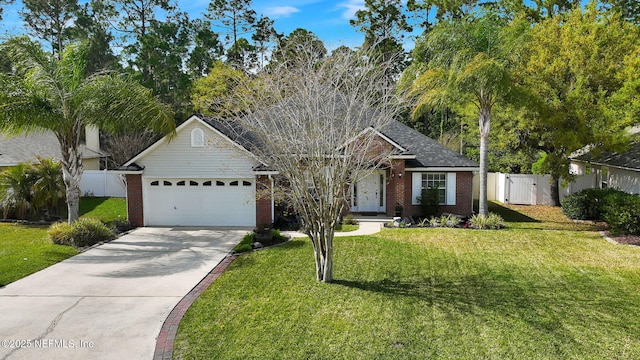ranch-style house featuring brick siding, a garage, concrete driveway, and a gate