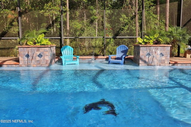 pool featuring glass enclosure