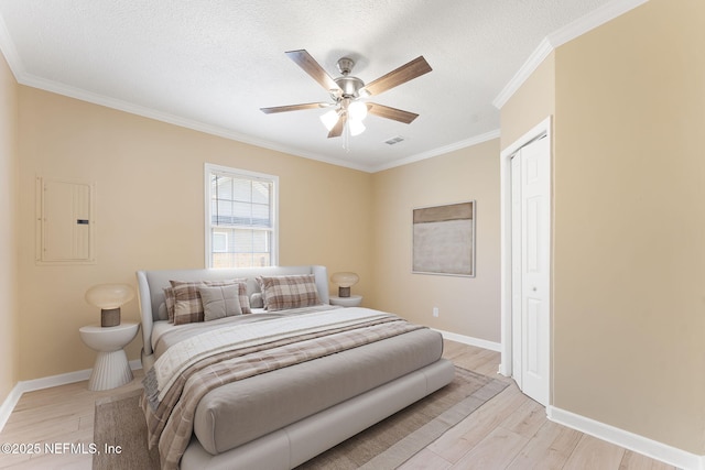 750 Saranac St, Jacksonville, FL 32254 - bedroom with visible vents, electric panel, crown molding, baseboards, and light wood-type flooring