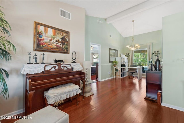 living area with beamed ceiling, visible vents, wood finished floors, baseboards, and a notable chandelier