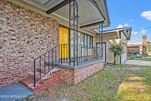3838 Winton Dr, Jacksonville, FL 32208 - view of exterior entry with brick siding