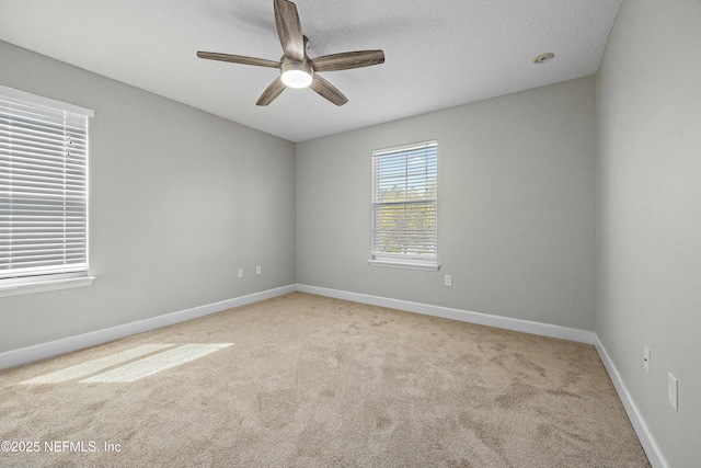 110 Arabian Ct, Saint Augustine, FL 32095 - unfurnished room with baseboards, a textured ceiling, ceiling fan, and carpet