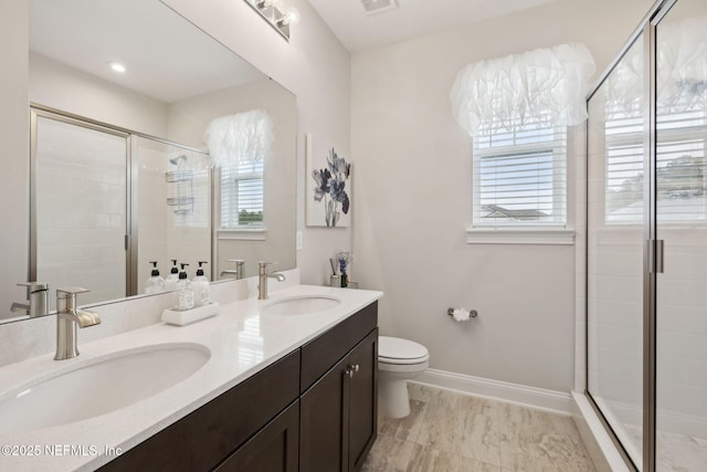64 Whirlaway Ct, Saint Johns, FL 32259 - full bath featuring a shower stall, double vanity, toilet, marble look tile flooring, and baseboards