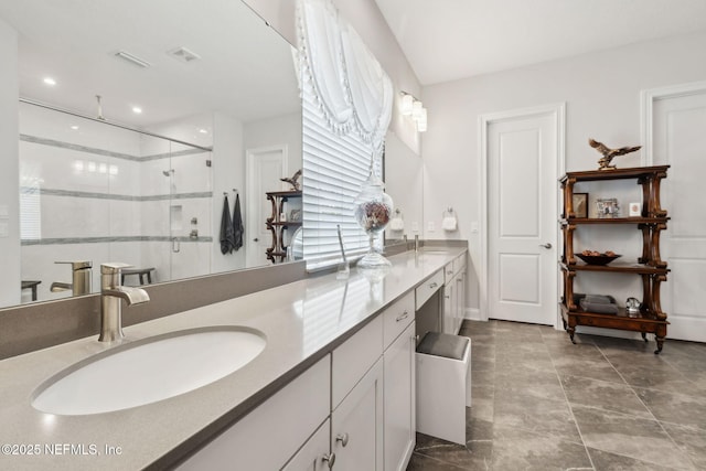 64 Whirlaway Ct, Saint Johns, FL 32259 - bathroom with double vanity, a stall shower, and recessed lighting