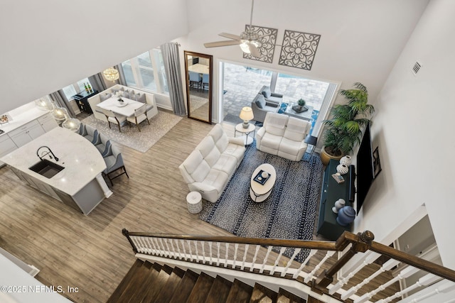 64 Whirlaway Ct, Saint Johns, FL 32259 - living room featuring a high ceiling, wood finished floors, and ceiling fan