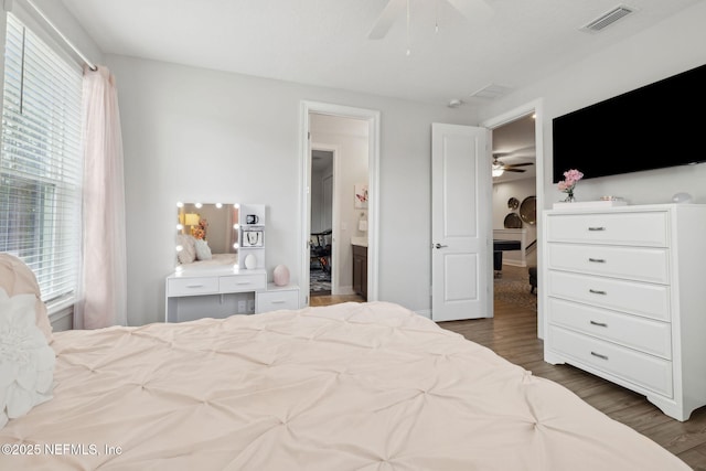 64 Whirlaway Ct, Saint Johns, FL 32259 - bedroom featuring wood finished floors, ceiling fan, and ensuite bath