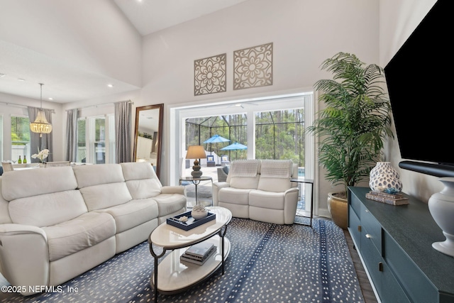 64 Whirlaway Ct, Saint Johns, FL 32259 - living room featuring healthy amount of natural light, a chandelier, a towering ceiling, and recessed lighting