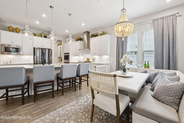 64 Whirlaway Ct, Saint Johns, FL 32259 - dining room with a chandelier, light wood-type flooring, and recessed lighting