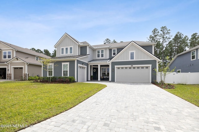 64 Whirlaway Ct, Saint Johns, FL 32259 - view of front of property featuring board and batten siding, decorative driveway, a garage, and a standing seam roof