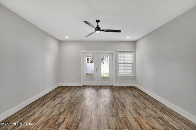 335 5th Ave S, Jacksonville Beach, FL 32250 - spare room featuring baseboards, ceiling fan, wood finished floors, and french doors