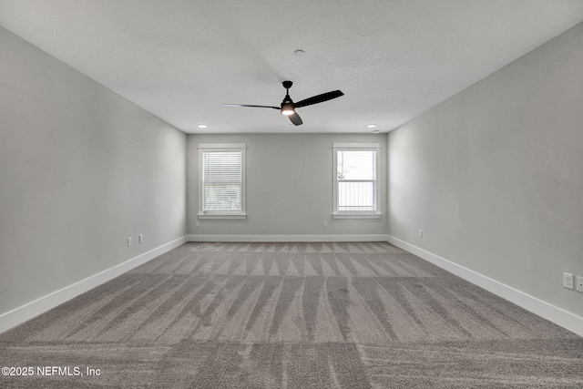 335 5th Ave S, Jacksonville Beach, FL 32250 - carpeted empty room with a ceiling fan, baseboards, and a textured ceiling