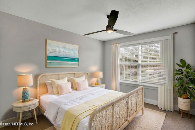 335 5th Ave S, Jacksonville Beach, FL 32250 - carpeted bedroom featuring baseboards and a ceiling fan