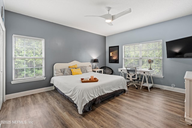 1053 Anchor Rd, Saint Johns, FL 32259 - bedroom with baseboards, ceiling fan, and wood finished floors