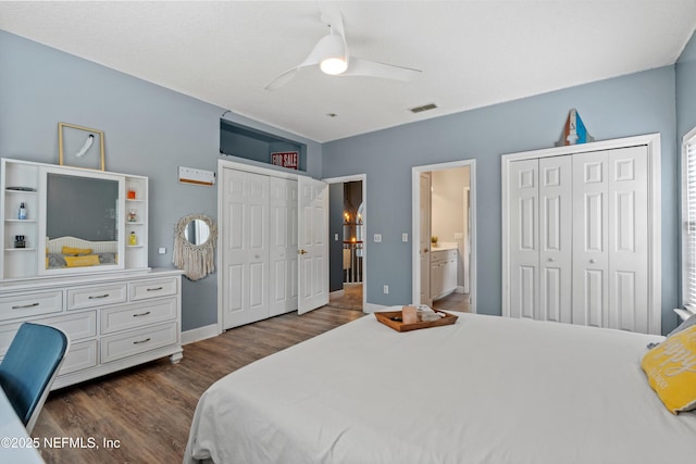 1053 Anchor Rd, Saint Johns, FL 32259 - bedroom with connected bathroom, dark wood finished floors, multiple closets, baseboards, and visible vents