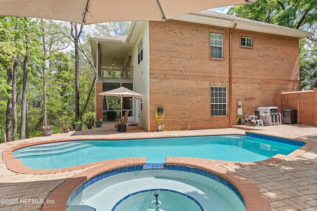 1053 Anchor Rd, Saint Johns, FL 32259 - view of swimming pool with a pool with connected hot tub and a patio