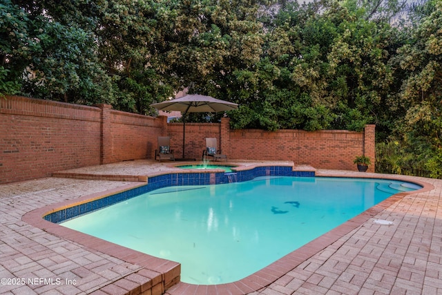 1053 Anchor Rd, Saint Johns, FL 32259 - view of pool with a fenced backyard, a pool with connected hot tub, and a patio area