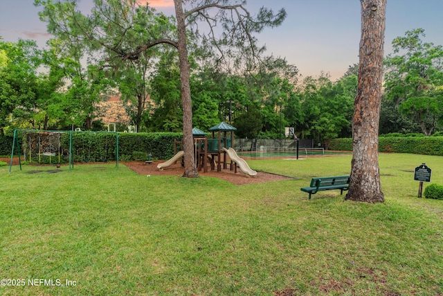 1053 Anchor Rd, Saint Johns, FL 32259 - yard at dusk with playground community and fence