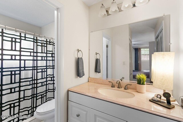 1202 Wolfe St, Jacksonville, FL 32205 - full bath with toilet, vanity, and curtained shower