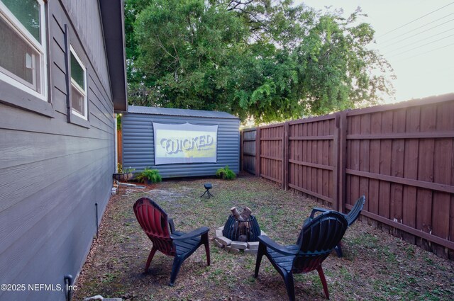 1202 Wolfe St, Jacksonville, FL 32205 - view of yard featuring fence and a fire pit