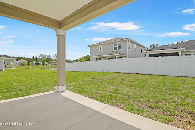 107 Arbor Alcove Ln, Saint Augustine, FL 32084 - view of yard with fence, a water view, and a patio area