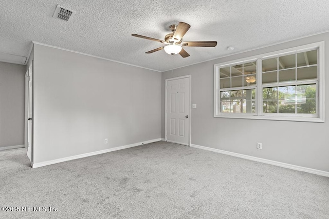 161 W 65th St, Jacksonville, FL 32208 - spare room with carpet floors, visible vents, crown molding, and ceiling fan