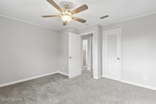 161 W 65th St, Jacksonville, FL 32208 - unfurnished bedroom featuring carpet flooring, visible vents, and ornamental molding