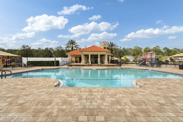 141 Casa Sevilla Ave, Saint Augustine, FL 32092 - community pool with a patio area and fence