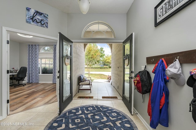 141 Casa Sevilla Ave, Saint Augustine, FL 32092 - entrance foyer featuring french doors and light tile patterned floors