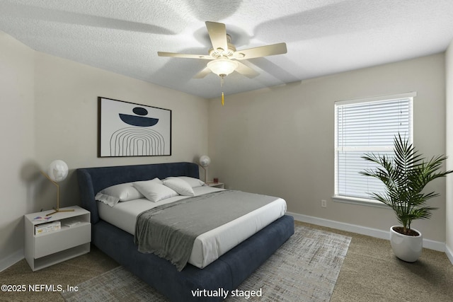 carpeted bedroom with baseboards, a ceiling fan, and multiple windows