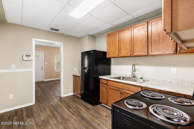 3051 4th Street Cir, Jacksonville, FL 32254 - kitchen with a sink, dark wood-style flooring, visible vents, black appliances, and a drop ceiling