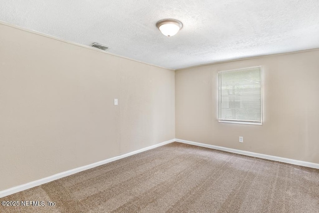 3051 4th Street Cir, Jacksonville, FL 32254 - carpeted empty room with baseboards, visible vents, and a textured ceiling
