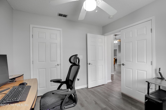 96086 Sea Winds Dr, Fernandina Beach, FL 32034 - office area featuring ceiling fan, wood finished floors, and baseboards