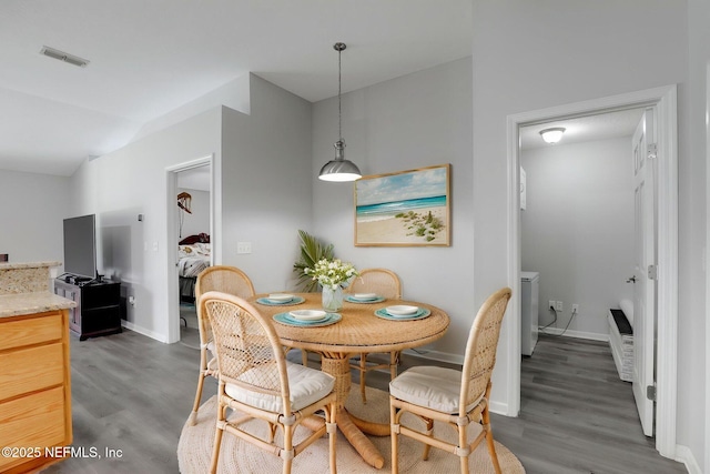 96086 Sea Winds Dr, Fernandina Beach, FL 32034 - dining area featuring wood finished floors and baseboards