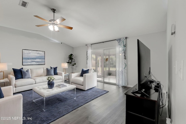 96086 Sea Winds Dr, Fernandina Beach, FL 32034 - living area with vaulted ceiling, wood finished floors, and a ceiling fan