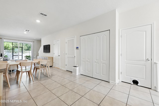 dining area with baseboards, visible vents, recessed lighting, and light tile patterned floors