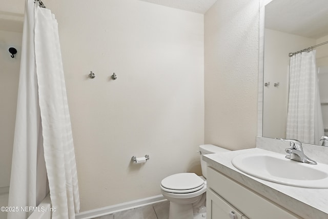 full bath featuring tile patterned floors, toilet, baseboards, and vanity