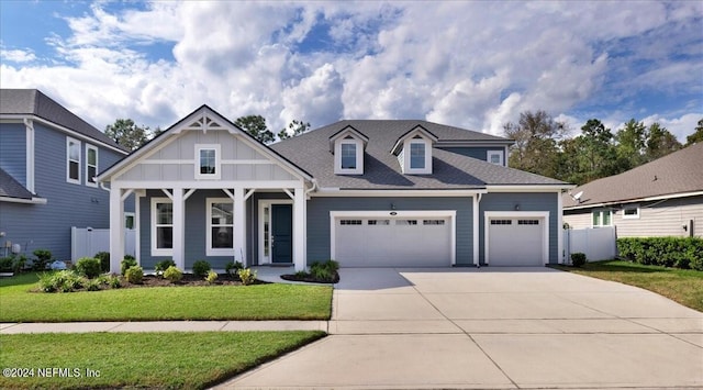 113 Footbridge Rd, Saint Johns, FL 32259 - view of front of property with driveway, an attached garage, fence, and a front lawn