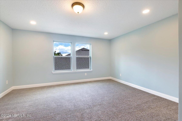 113 Footbridge Rd, Saint Johns, FL 32259 - carpeted spare room featuring baseboards, a textured ceiling, and recessed lighting