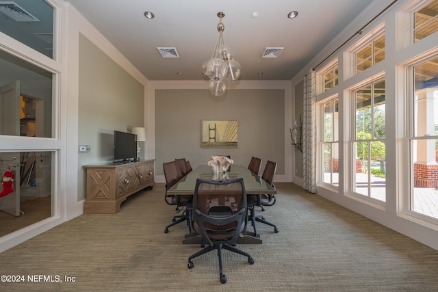 113 Footbridge Rd, Saint Johns, FL 32259 - dining space with light carpet, visible vents, crown molding, and an inviting chandelier