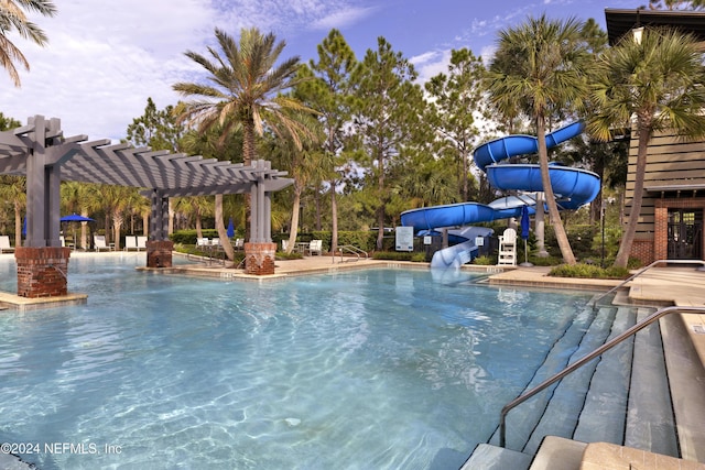 113 Footbridge Rd, Saint Johns, FL 32259 - pool with a pergola, a water slide, and a patio area