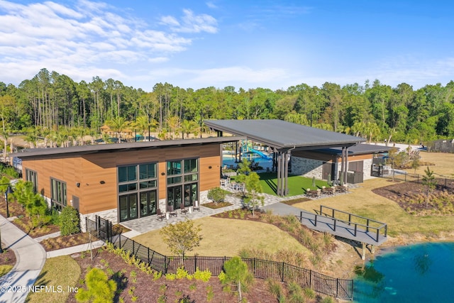 113 Footbridge Rd, Saint Johns, FL 32259 - back of property with stone siding and fence