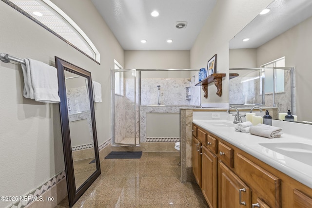 4 Pamela Pkwy, Palm Coast, FL 32137 - full bathroom featuring a stall shower, double vanity, recessed lighting, and a sink