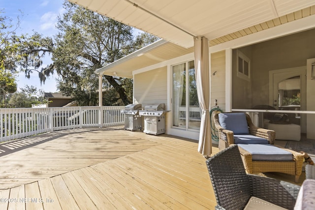 4 Pamela Pkwy, Palm Coast, FL 32137 - wooden deck featuring grilling area