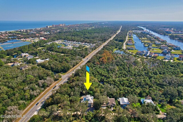 4 Pamela Pkwy, Palm Coast, FL 32137 - birds eye view of property featuring a water view